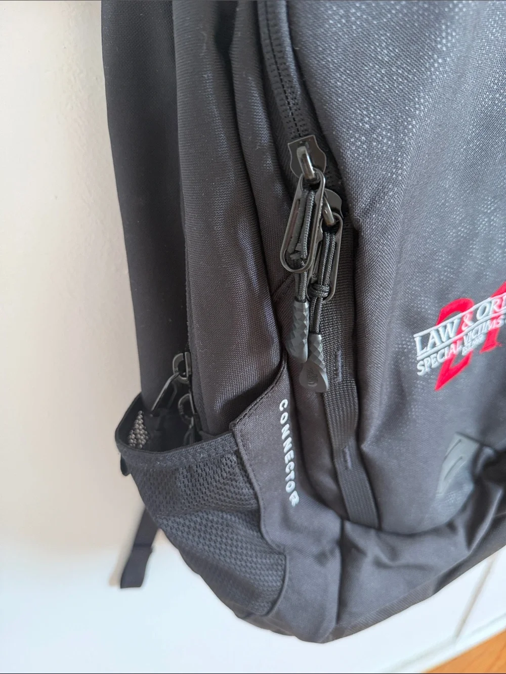 The North Face Black Backpack with Red Law & Order SVU Accent